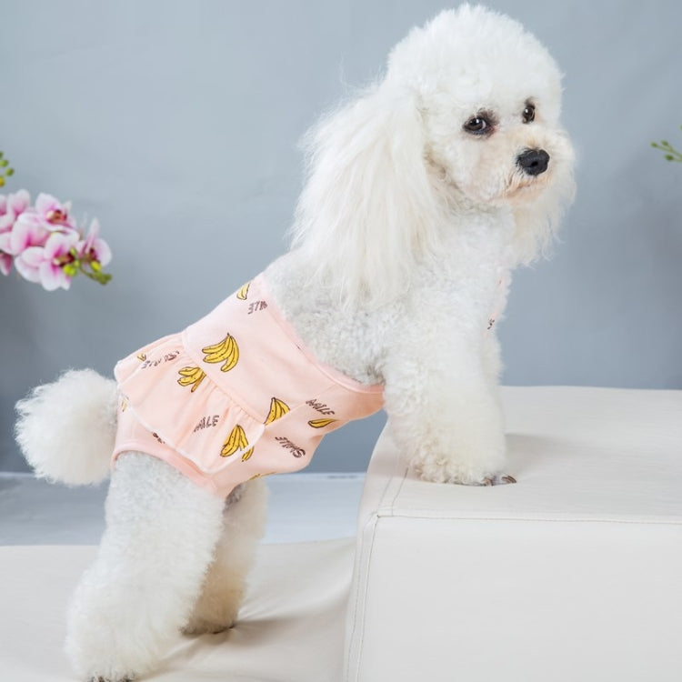 Pink banana-printed dog pants on small dog, front view with ruffled waist