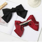 Wine red satin bow hairpin with silver clip, size mark 10cm; plus black bow