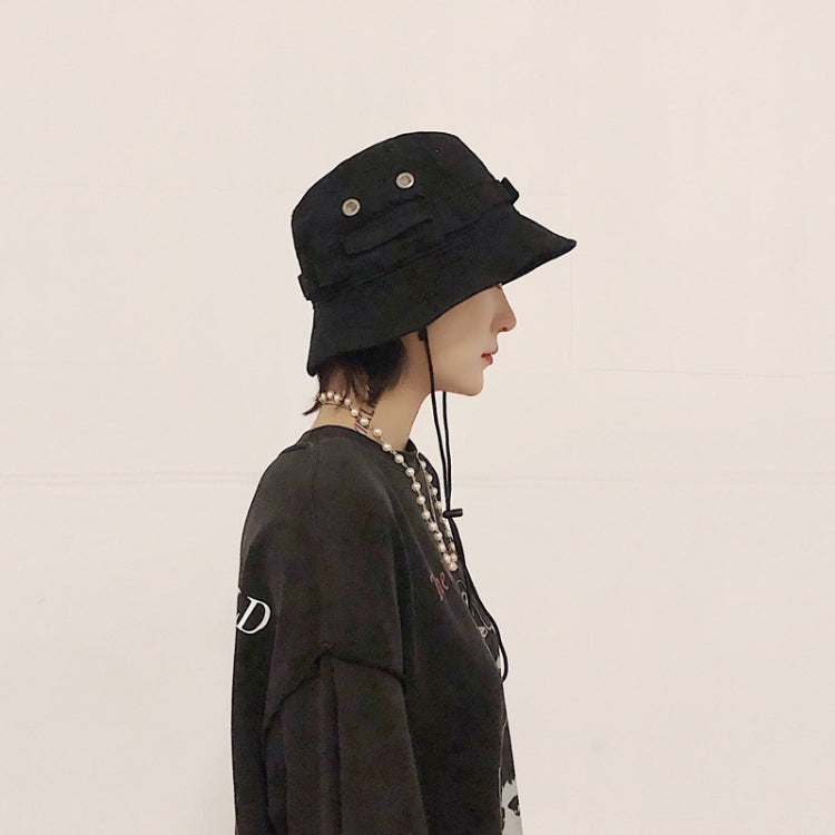 Black fisherman bucket hat with metal grommets and chin drawstring