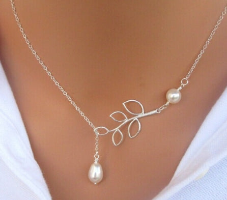 Silver leaf pendant necklace with dangling pearl charm and delicate chain