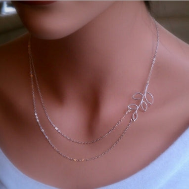 Silver double-strand leaf pendant necklace with small leaf link charm