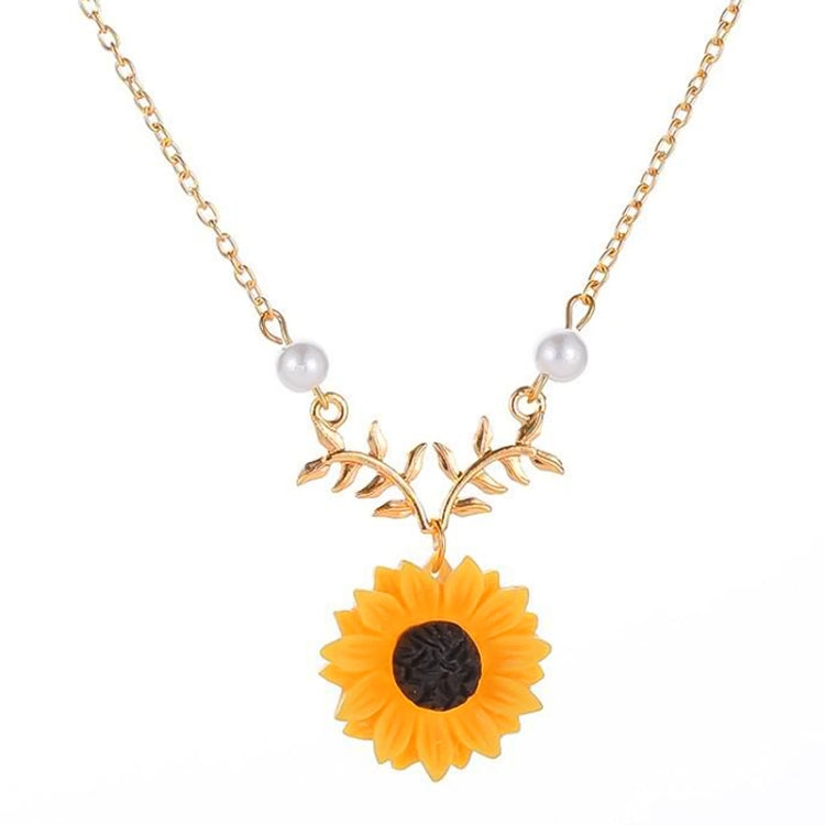 Gold-toned sunflower pendant necklace with faux pearl beads and leaf branch charm