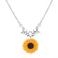 Silver sunflower pendant necklace with faux pearl beads and leaf branch charm