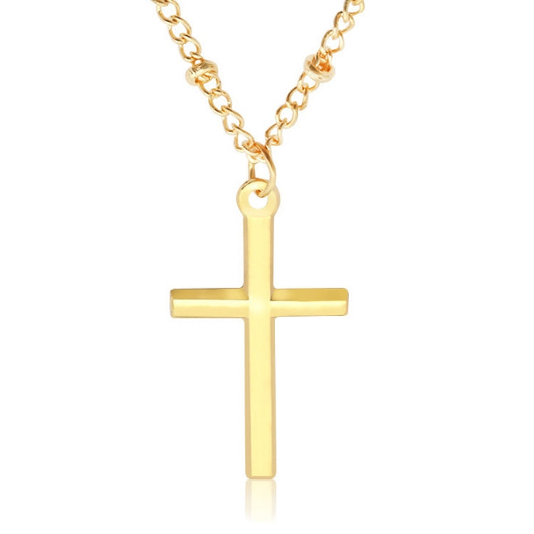Gold cross pendant on a chain necklace with a small loop top and polished finish.