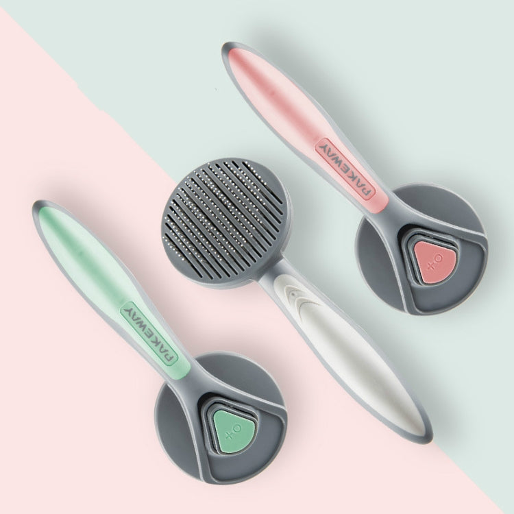 Set of pet self-cleaning grooming brushes with pink, mint, and white handles and pin heads