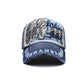 Casual baseball cap in light blue and navy with embroidered letters, star accents, and distressed brim.