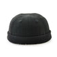 Foldable brim hat in black with small grommet vents and stitched panel seams