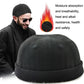 Black foldable brim hat worn by a man with sunglasses