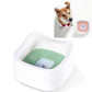 White floating pet water bowl with green interior tray and splash-proof float