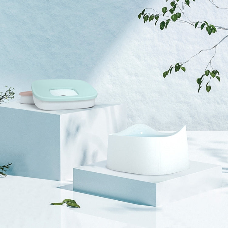 White floating pet water bowl with light blue tray insert on a raised stand
