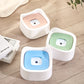 Set of three floating pet water bowls with white bases and blue, green, and pink trays