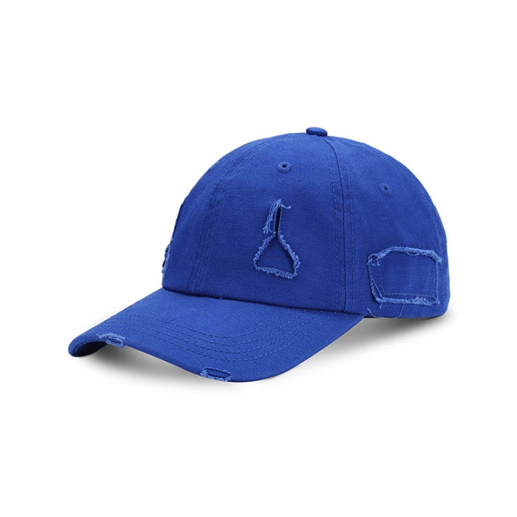 Washed blue baseball cap with distressed side panels and stitched triangle applique