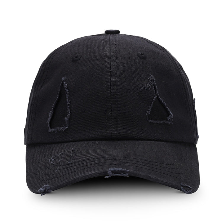Washed black baseball cap with distressed triangle applique and torn brim