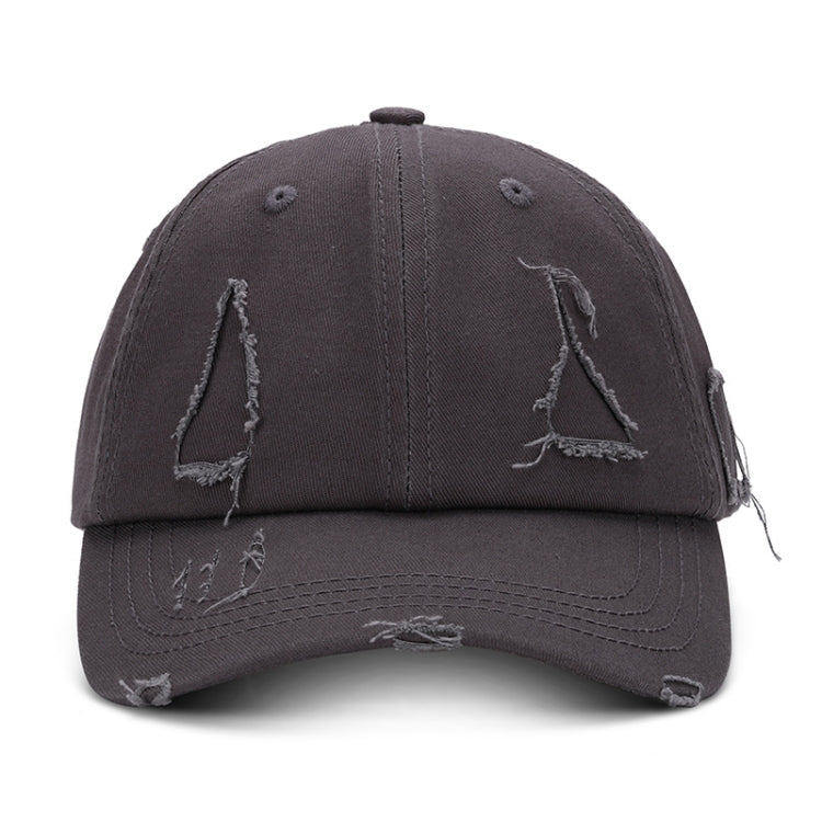 Washed dark gray baseball cap with distressed triangle applique and torn brim