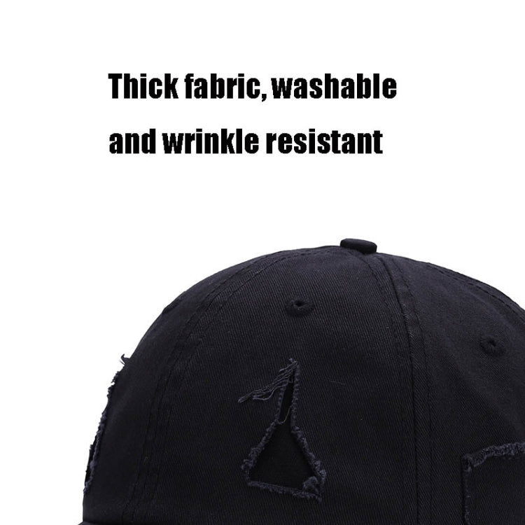 Washed black baseball cap with embroidered triangle logo and curved brim