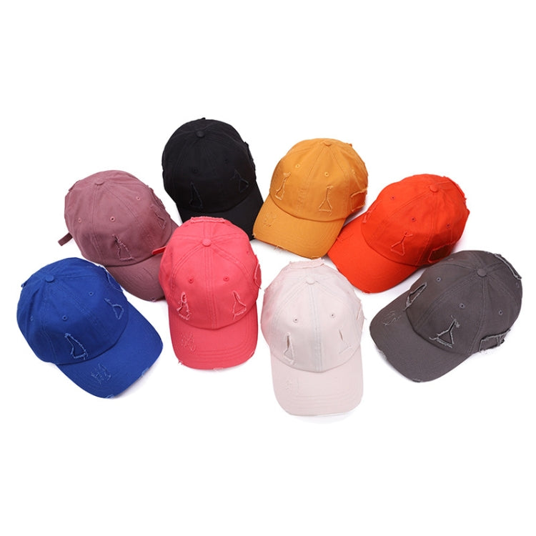 Assorted washed baseball caps in multiple colors, distressed triangle logos