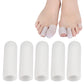 Set of white closed toe corn protectors, caps lined up