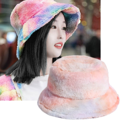 Plush rainbow fisherman bucket hat with wide brim, pastel pink, blue, and purple.