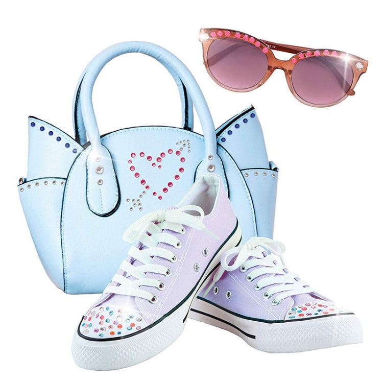 Light blue tote bag, sneakers, and pink sunglasses decorated with rhinestone sticker details
