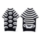 Pet sweater pair, black knit with white skulls and black-and-white striped cuffs