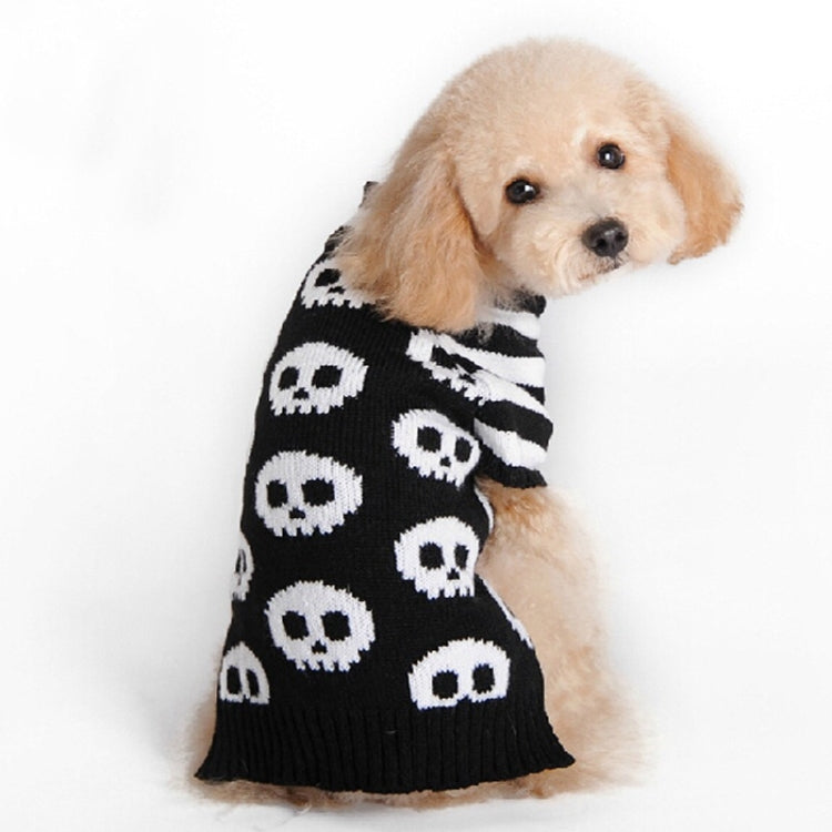 Pet skull sweater on a dog, black knit with white skulls and ribbed hem