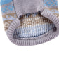 Pet knitted sweater hem detail, ribbed cuff with blue and tan fair-isle pattern