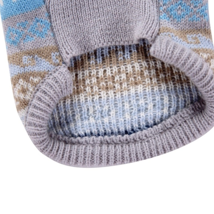 Pet knitted sweater hem detail, ribbed cuff with blue and tan fair-isle pattern