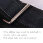 Close-up of black webbing waist belt with metal buckle
