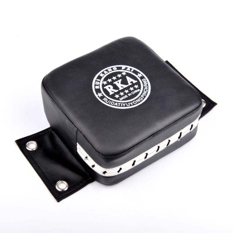 Black square wall target pad with RKA logo, white trim, and side mounting strap