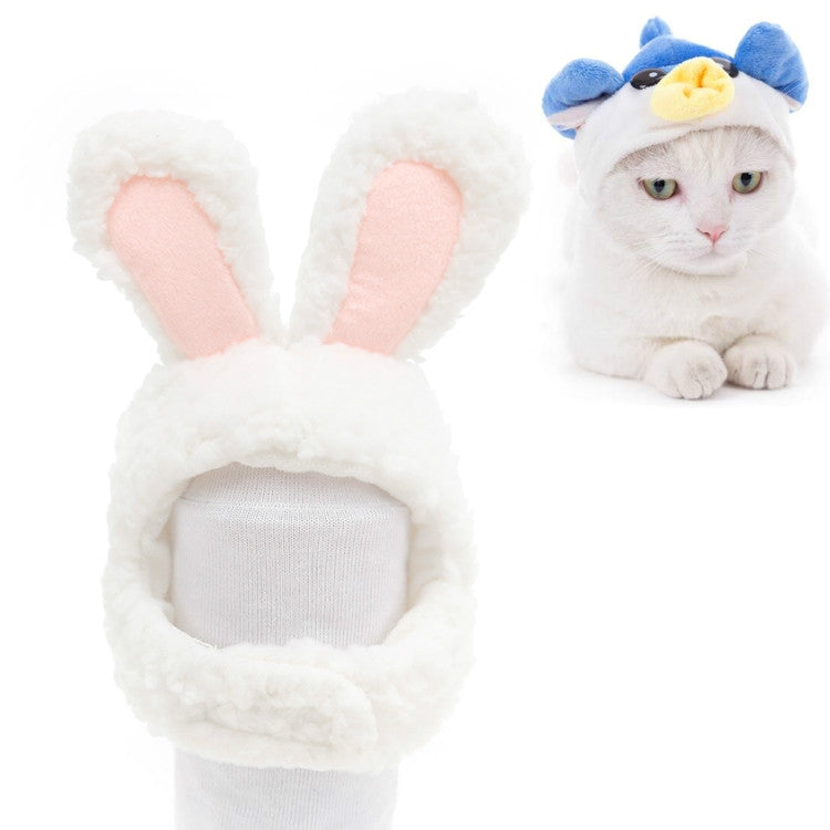 White plush bunny pet hat with pink ears on a cat, gray knit opening