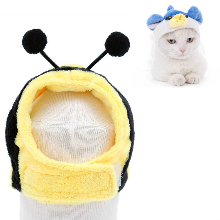 Bee plush pet hat with yellow lining, black fuzzy antenna dots, and open face panel