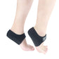 Black gel heel protective cover with printed logo patch, worn on foot