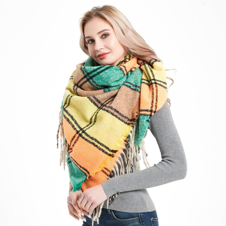 Plaid fringed scarf in teal, yellow, and brown with black check lines