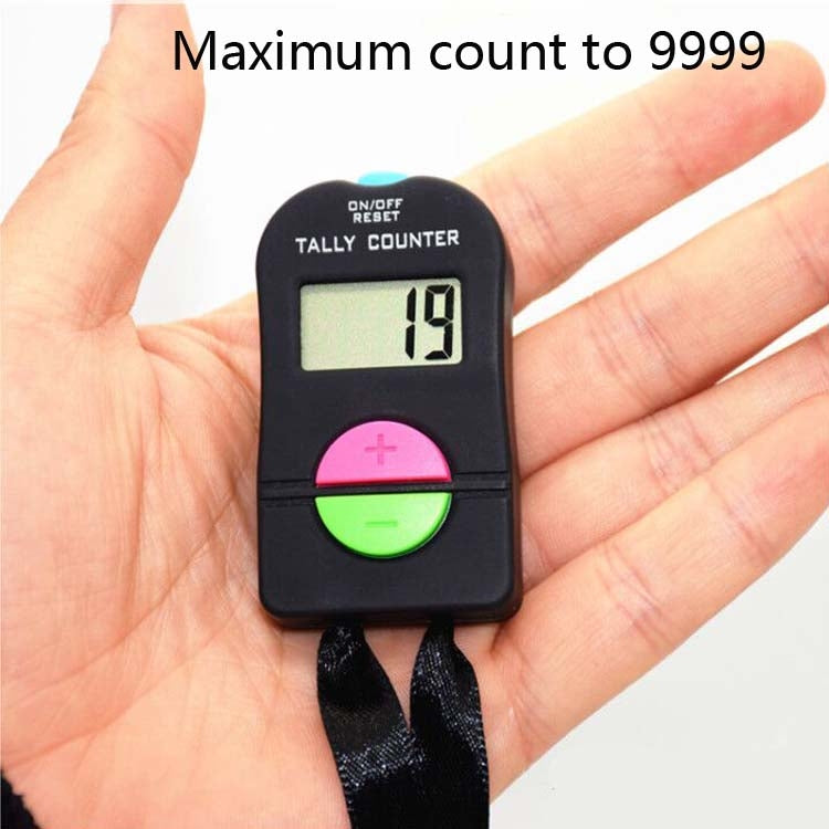 Black manual tally counter on open palm with LCD count display and plus/minus buttons
