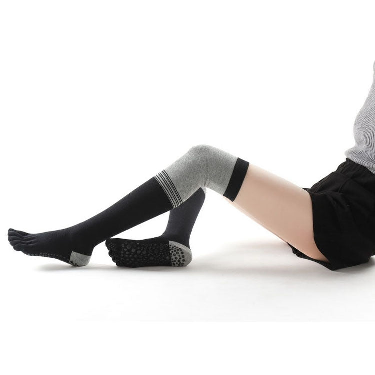 Striped gray over-the-knee five-toe yoga socks with textured anti-slip sole pads