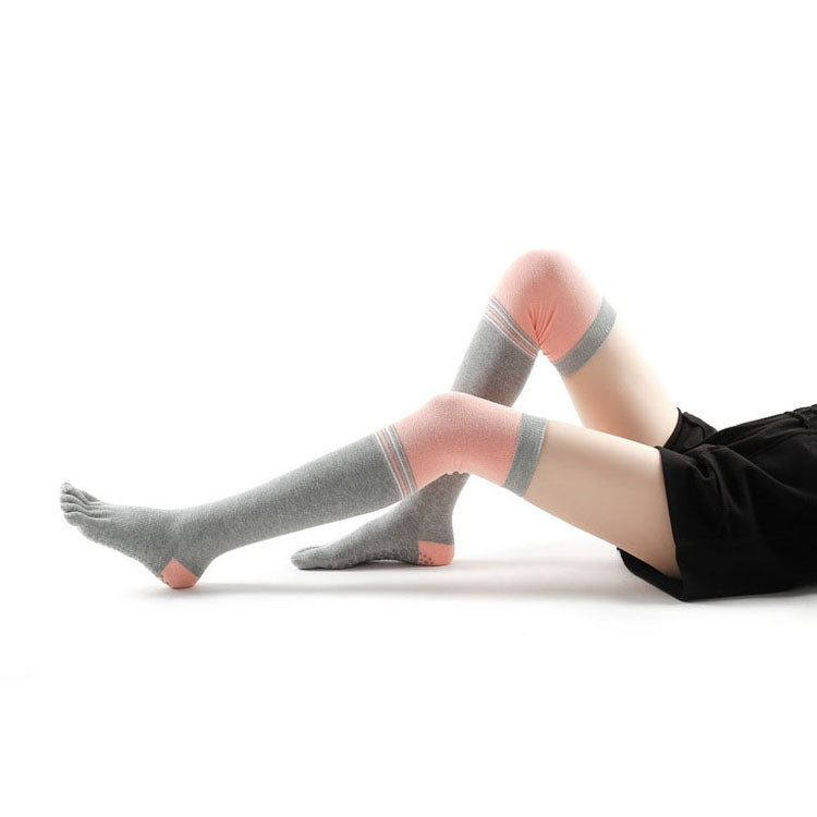 Gray over-the-knee five-toe yoga socks with coral accents and anti-slip pads