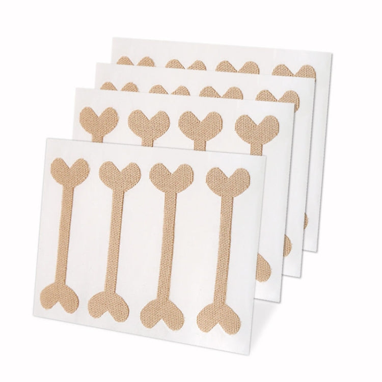 Set of beige toe nail correction tape strips on white adhesive backing cards