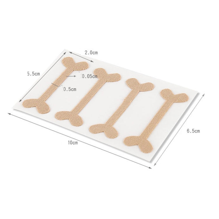 Flat layout of beige toe nail correction tape strips on rectangular backing sheet