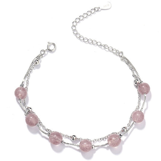 Silver bracelet with double rows of pink round crystal beads and lobster clasp