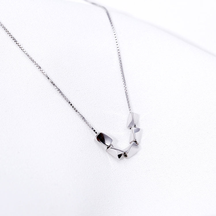 Sterling silver necklace with central link charm detail and reflective finish