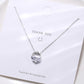 Sterling silver heart pendant necklace with clear faceted stone and chain