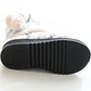 Black ribbed rubber sole of winter high-top knit slippers
