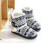 Navy and white knit winter high-top slippers with fuzzy lining and black rubber sole