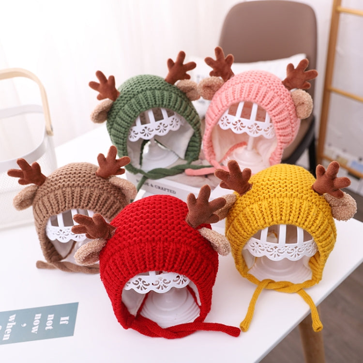Assorted baby knitted antler hats in red, yellow, pink, green, and brown with tie strings