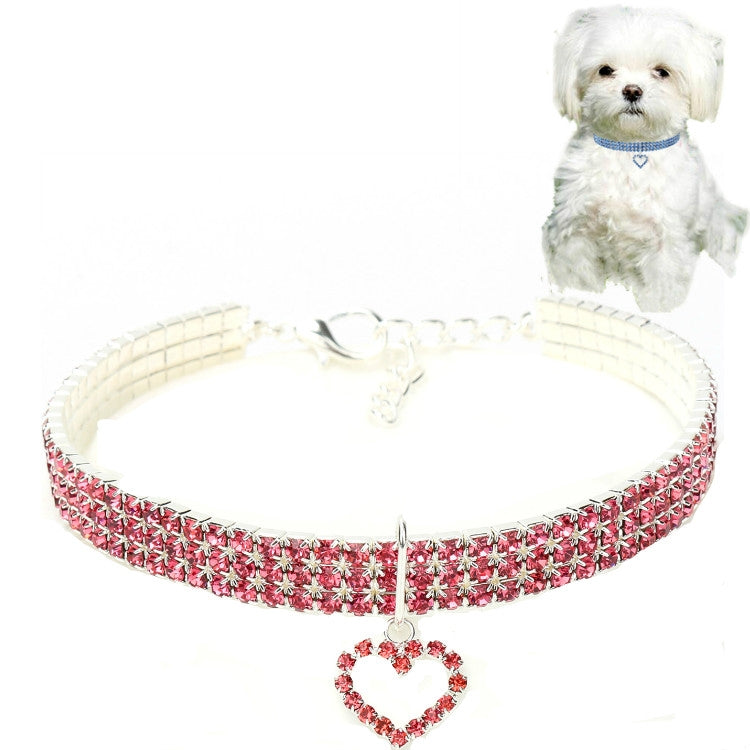 Pink jeweled elastic pet collar with heart charm pendant and buckle clasp