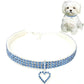 Blue jeweled elastic pet collar with heart charm pendant and buckle clasp