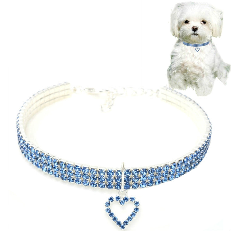 Blue rhinestone elastic pet collar with heart charm and center clasp, adjustable stretch fit