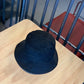 Black corduroy fisherman hat with wide brim and foldable crown
