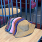 Assorted corduroy fisherman hats in mixed colors, stacked foldable bucket styles