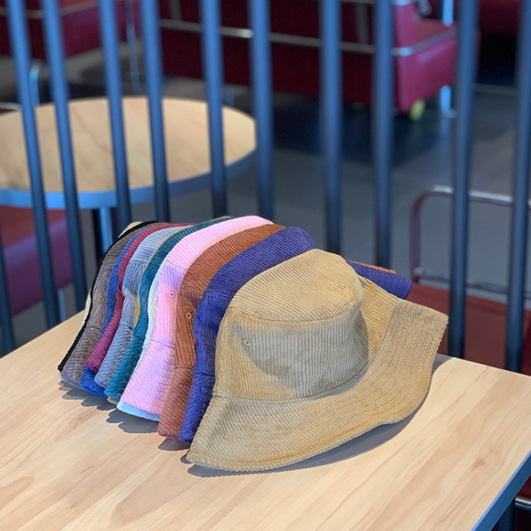 Assorted corduroy fisherman hats in mixed colors, stacked foldable bucket styles
